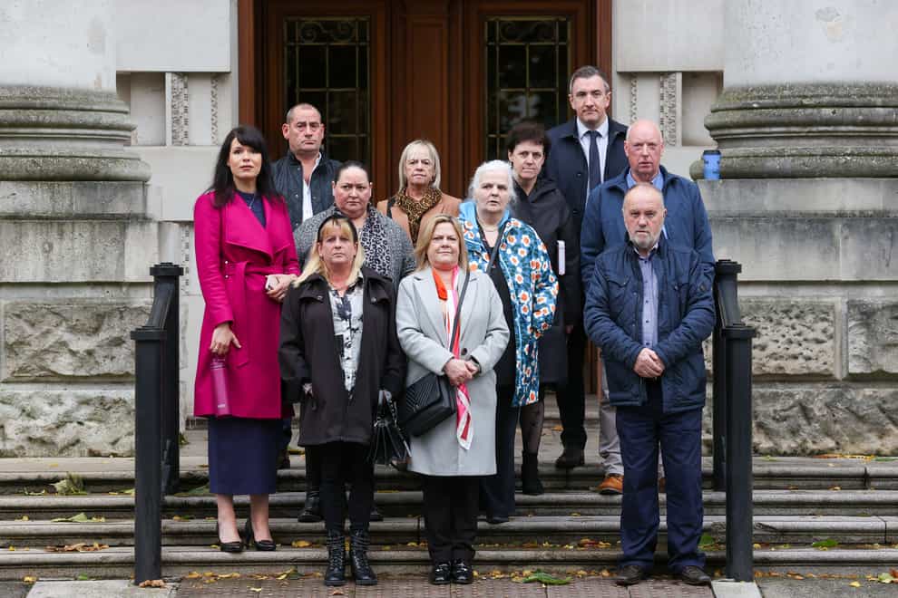 (left to right) Grainne Teggart, Deputy Director of Amnesty International in Northern Ireland, with Michael McManus, Martina Dillon, wife of Seamus Dillon, (unknown), sisters Isobel, Donna and Lynda McManus, the daughters of James McManus, Mairead and Roisin Kelly, the sisters of Paddy Kelly, Gavin Booth of Phoenix Law, Peter McCarthy, and Francie O’Callaghan outside the Royal Courts of Justice, Belfast (Liam McBurney/PA)