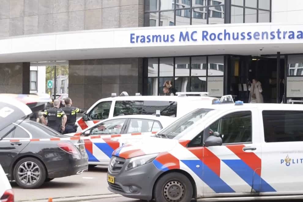 Emergency services outside the Erasmus Medical Centre in Rotterdam (AP)