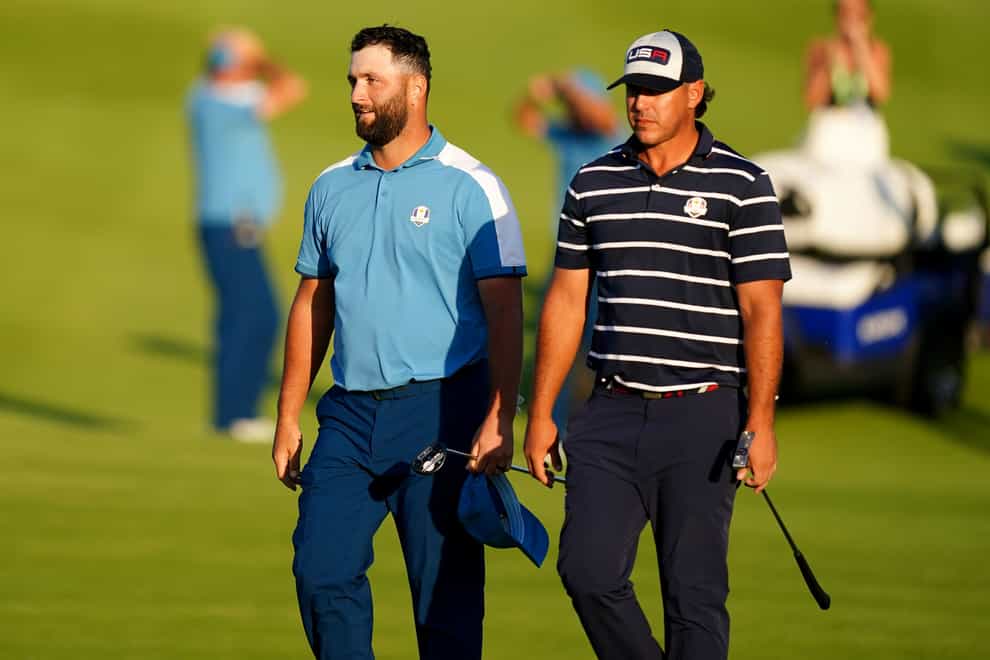 Brooks Koepka (right) appeared to take a swipe at the conduct of Jon Rahm (left) at the Ryder Cup (Zac Goodwin/PA)