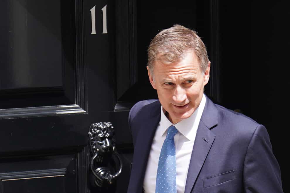 Chancellor Jeremy Hunt is facing calls from senior Tories to deliver tax cuts (James Manning/PA)