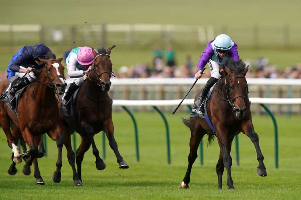 Ghostwriter ridden by Richard Kingscote (right) on their way to winning the Juddmonte Royal Lodge Stakes during day Three of the Cambridgeshire Meeting at Newmarket Racecourse (Tim Goode/PA)