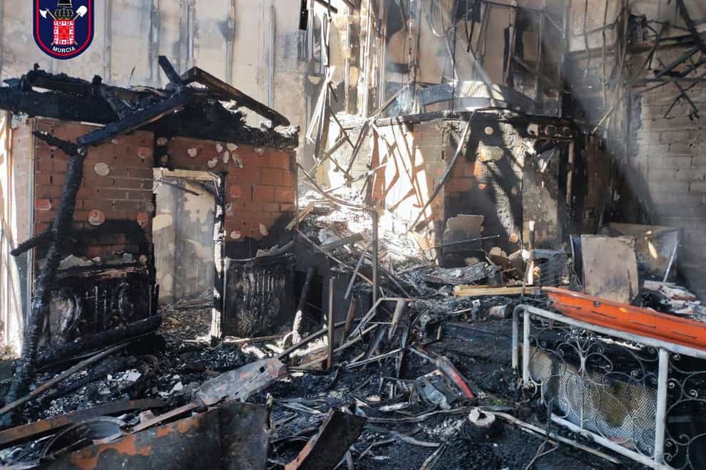 Part of the burned-out interior the nightclub (Bomberos/ayuntamiento de Murcia, via AP)