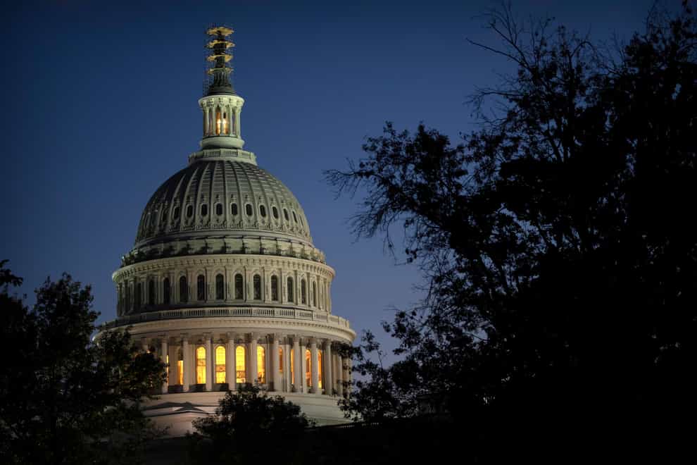 Night falls on the dome of the Capitol, hours after Kevin McCarthy was ousted as Speaker of the House (Mark Schiefelbein, AP)