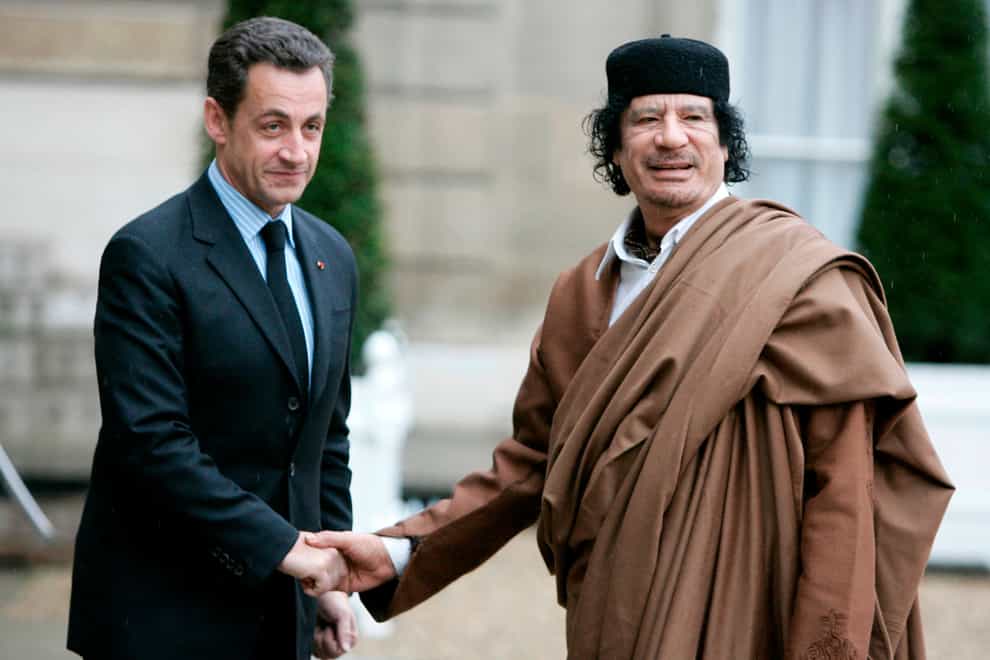 Ex-French president Nicolas Sarkozy with Libyan leader Muammar Gaddafi (Francois Mori/AP)