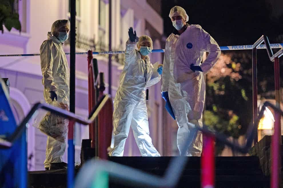 Forensic investigators at the scene in Brighton where a 17-year-old boy was stabbed to death (Jamie Lashmar/PA)