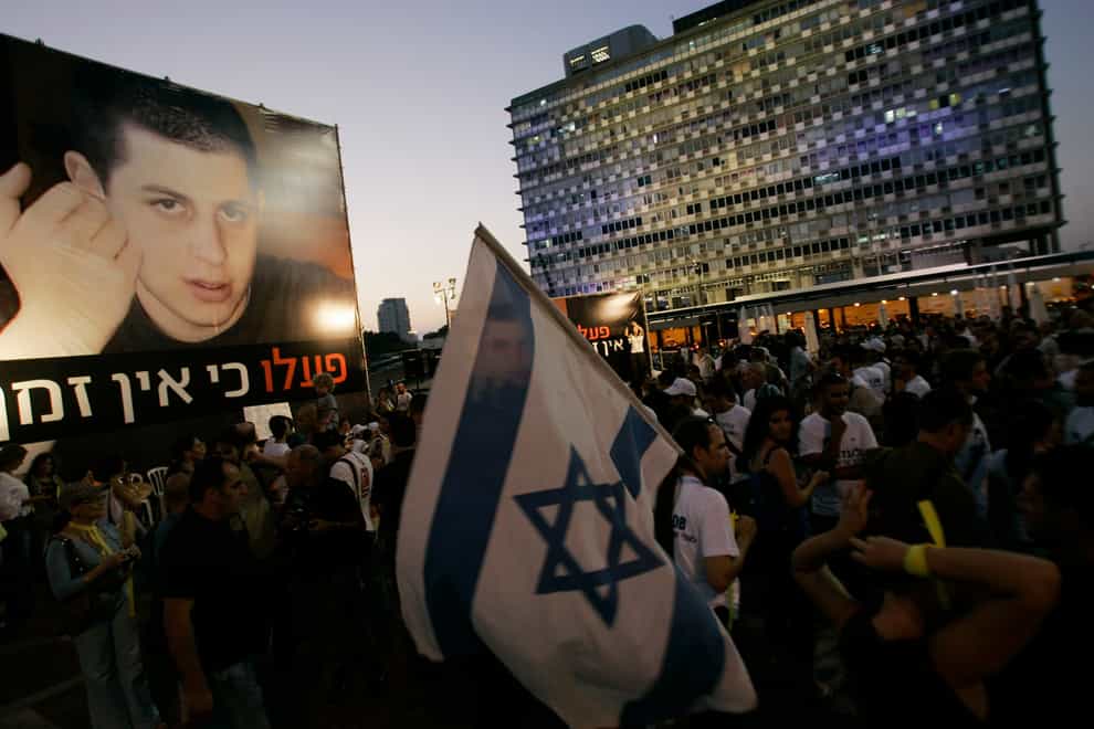 Israelis call for the release of abducted Israeli soldier Gilad Shalit in 2008, in Tel Aviv (Ariel Schalit/AP)