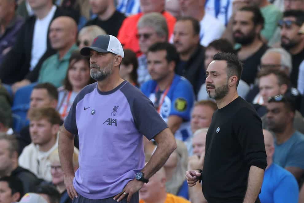 Roberto De Zerbi, right, praised Liverpool manager Jurgen Klopp after Sunday’s 2-2 draw at the Amex Stadium (Steven Paston/PA)