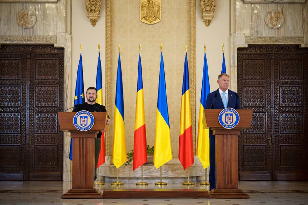 Ukraine’s President Volodymyr Zelensky speaks to the media with Romanian President Klaus Iohannis at the Cotroceni Presidential Palace in Bucharest (Andreea Alexandru/AP/PA)