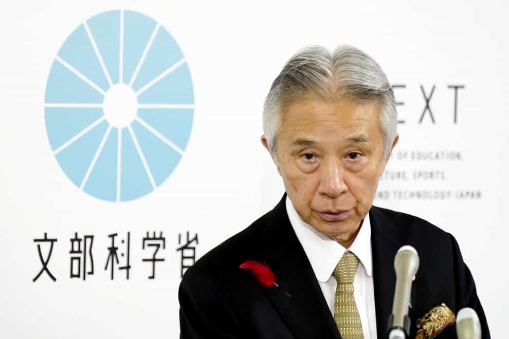 Japan’s education minister Masahito Moriyama speaks at a press conference in Tokyo (Kyodo News via AP)