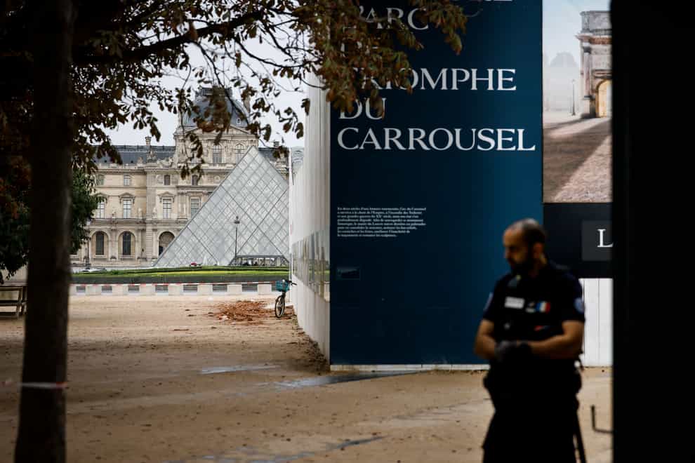 The Louvre welcomes between 30,000 and 40,000 visitors per day (Thomas Padilla/AP)