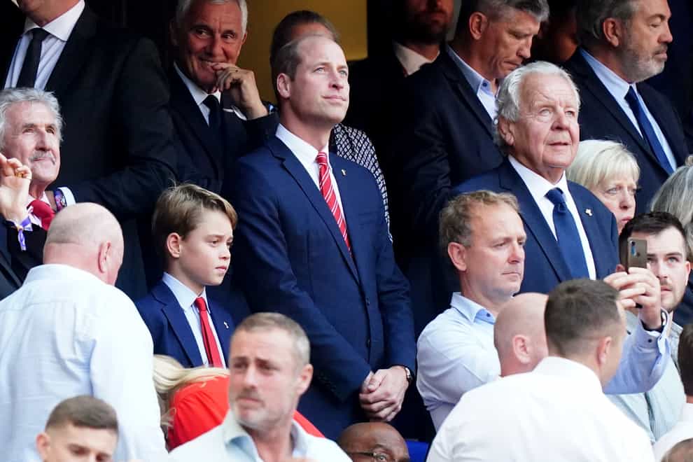 The Prince of Wales and his son Prince George in the stands before Wales’ Rugby World Cup 2023 quarter final match in Marseille (Mike Egerton/PA)