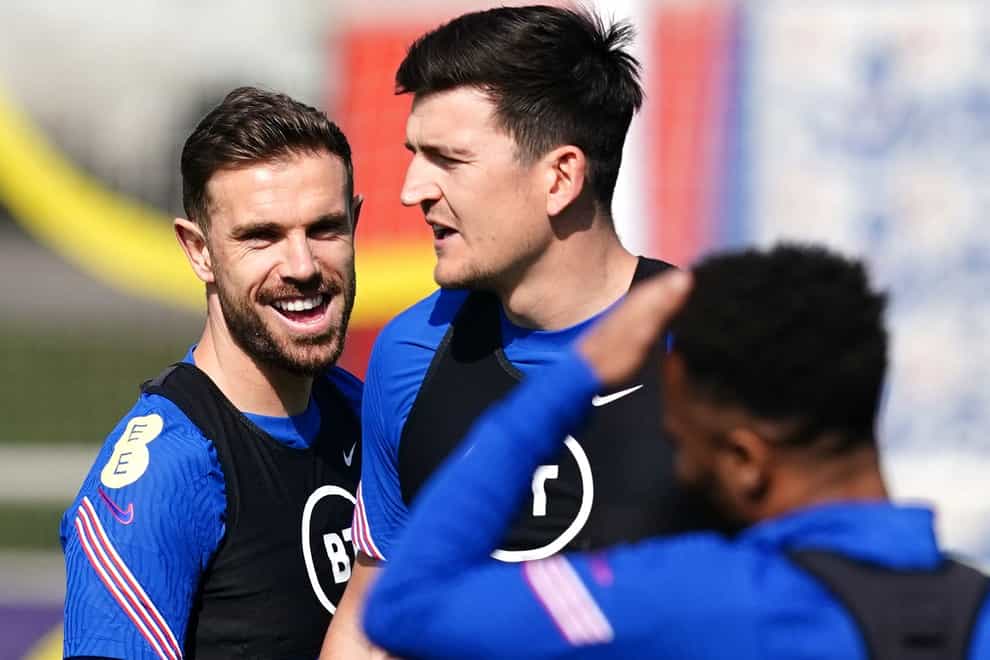Harry Maguire (centre) insists any supporters who booed Jordan Henderson are not “real” England fans (Martin Rickett/PA)