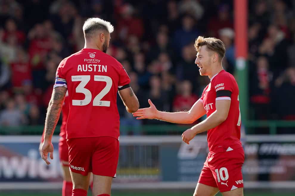 Charlie Austin (left) thought his 50th goal for Swindon had secured a win at Salford, but Liam Humbles levelled in stoppage time (Jonathan Brady/PA)