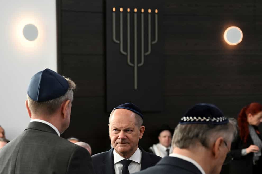 Mr Scholz spoke during the inauguration of the newly built synagogue in Dessau, Germany (Pool via AP)