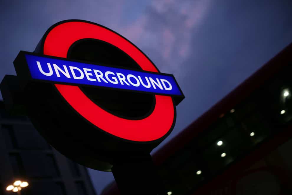 File photo of a London Underground sign against the night sky (Yui Mok/PA).