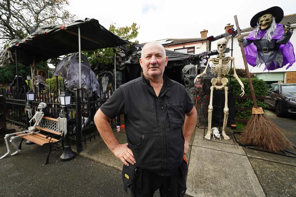 Electrician Ken Carraher continues preparations on his Halloween House of Horrors in Killiney, Dublin (Brian Lawless/PA)