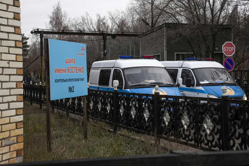 Ambulances parked at the coal mine in Karaganda where 32 workers died (AP/PA)