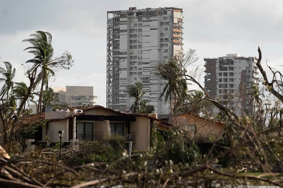 Buildings are surrounded by debris in the aftermath of Hurricane Otis (AP)