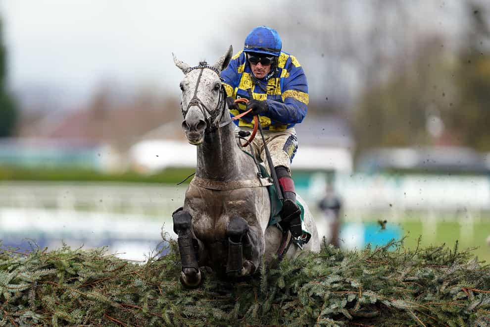 Bill Baxter ridden by jockey Sam Twiston-Davies clear a fence on their way to winning the Randox Supports Race Against Dementia Topham Handicap Chase during day two of the Randox Grand National Festival at Aintree Racecourse, Liverpool. Picture date: Friday April 14, 2023.
