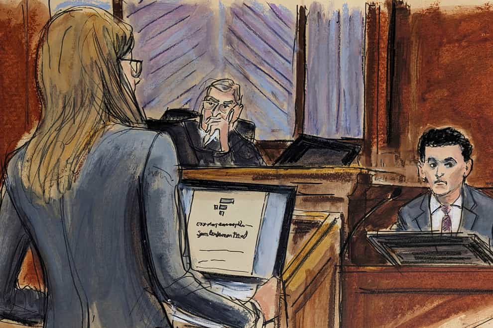 In this courtroom sketch, FTX founder Sam Bankman-Fried, right, is cross-examined by assistant US attorney Danielle Sassoon, left, while Judge Lewis Kaplan listens, centre, in Manhattan federal court in New York (Elizabeth Williams via AP)