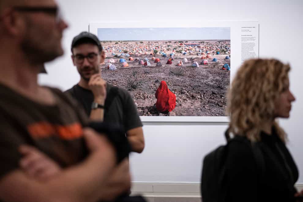 Jonathan Fointaine’s The Nomad’s Final Journey, which was awarded with an honourable mention by the World Press Photo jury, at the opening of the World Press Photo 2023 exhibition at the Hungarian National Museum, in Budapest (Szigetvary Zsolt/MTI/AP)