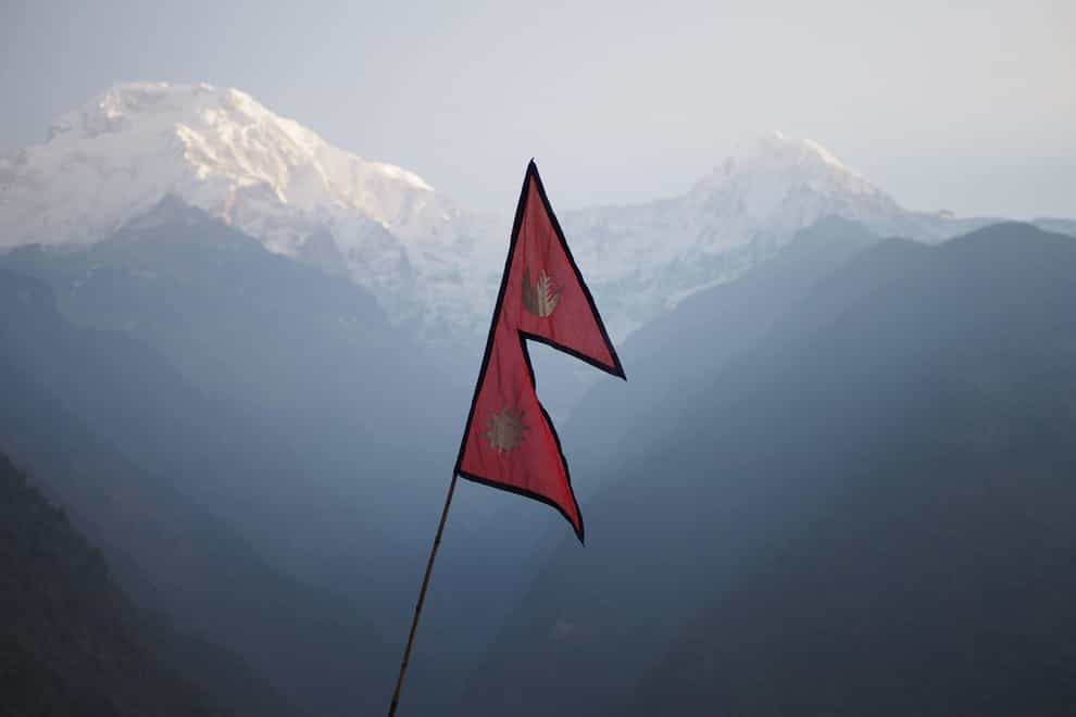 Nepal flag (Alamy/PA)