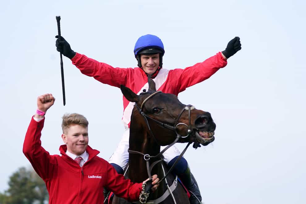 Paul Townend celebrates winning the Punchestown Gold Cup on Allaho (Brian Lawless/PA)