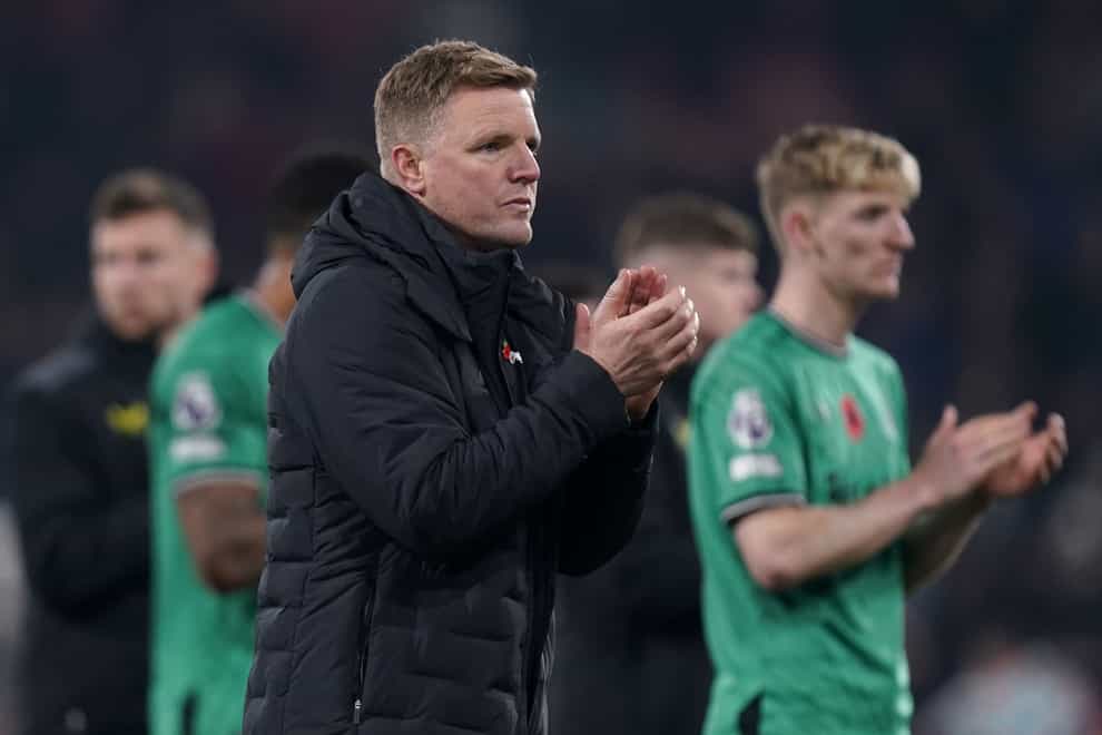 Eddie Howe applauds the Newcastle fans after defeat at Bournemouth (Andrew Matthews/PA)