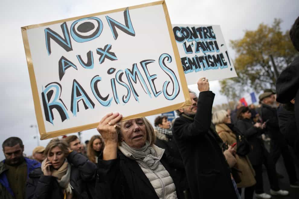 The protest took place on the streets of Paris (Christophe Ena/AP)