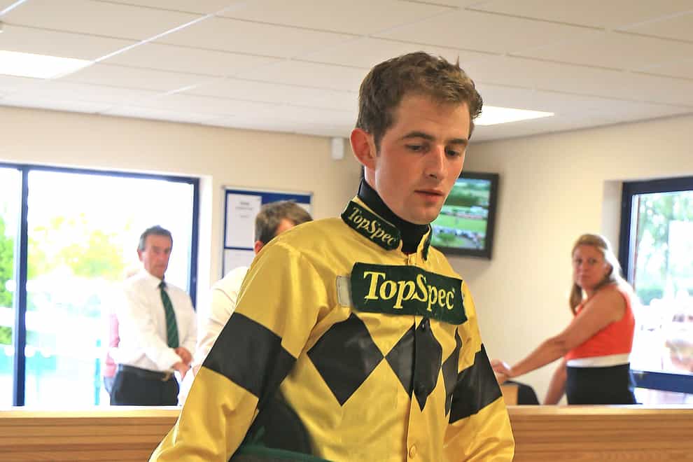Jockey Brian Toomey weighs in at Southwell Racecourse, Nottinghamshire.