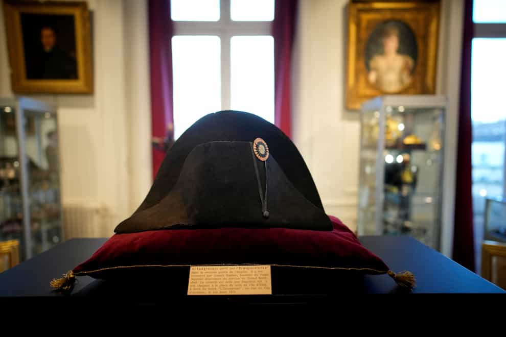 One of the signature broad, black hats that Napoleon wore when he ruled 19th-century France and waged war in Europe is on display at Osenat’s auction house in Fontainebleau, south of Paris (Christophe Ena/AP)