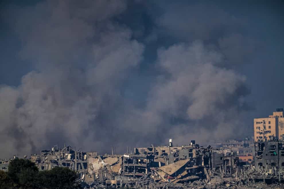 Smoke rises after an Israeli strike on the Gaza Strip (Ariel Schalit/AP)