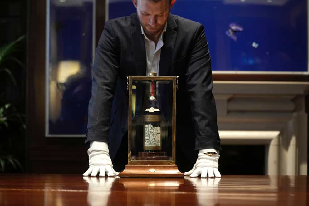A bottle of Macallan Adami 1926 whisky on display during a media preview at Sotheby’s auction house in London (Kin Cheung/AP)