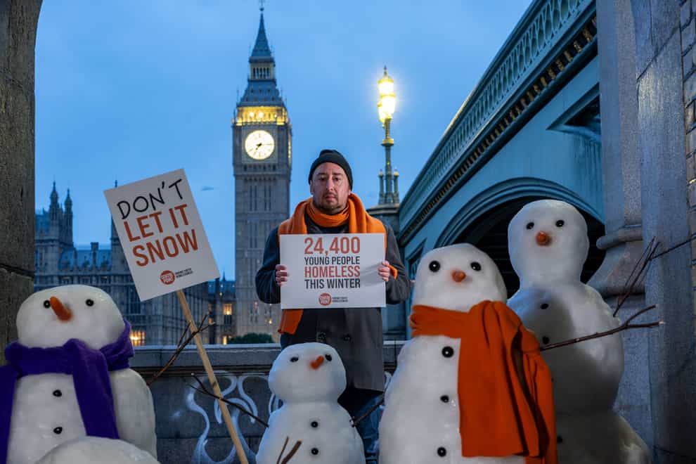Centrepoint stages a snowman protest to highlight the 24,400 young people who will face homelessness this Winter (Jeff Moore/PA)Don’t let it snowPicture Shows Paul Brocklehurst, Centrepoint Senior Helpline Manager