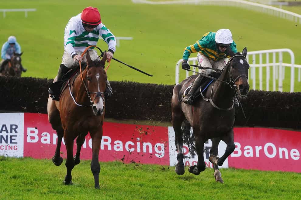 American Mike (left) impressed on chasing debut (Brian Lawless/PA)