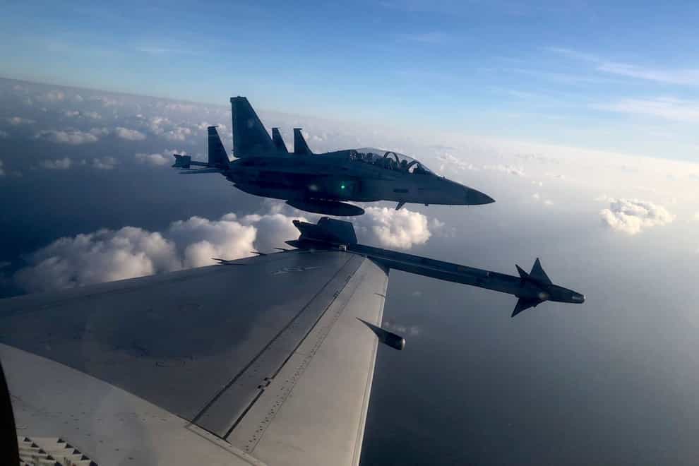 A Philippine Air Force FA-50PH jet fighter, joins the maritime patrol of the Philippines and the United States over Batanes and areas in the West Philippine Sea (Philippine Air Force via AP)