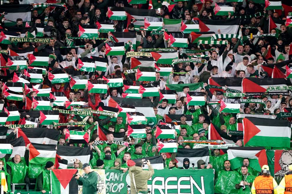 Celtic fans defied their club’s wishes by displaying flags against Atletico Madrid last month (Andrew Milligan/PA)
