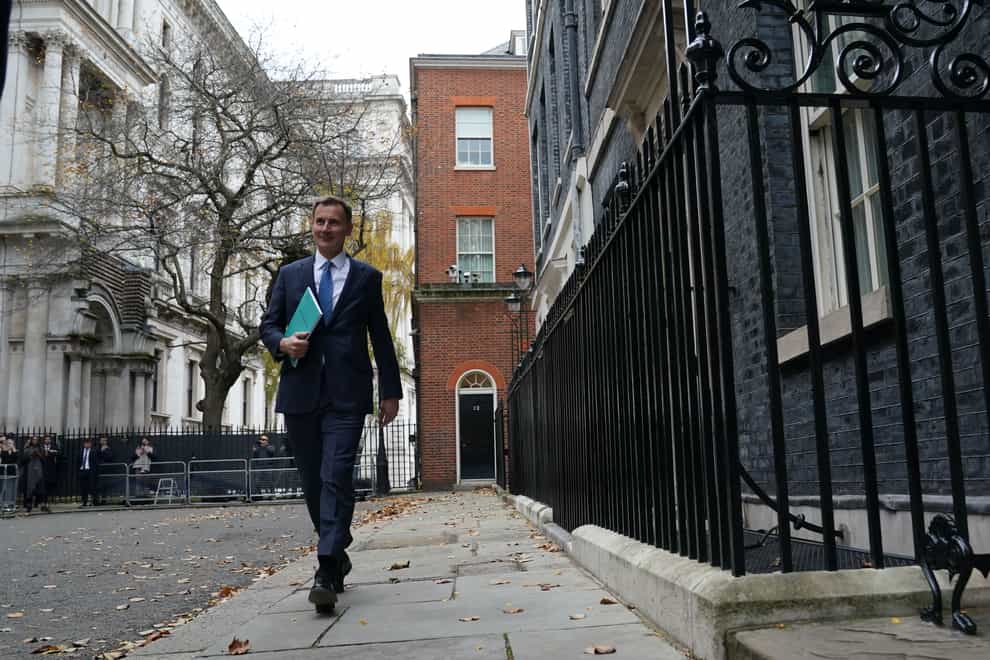 Chancellor of the Exchequer Jeremy Hunt leaves Downing Street ahead of his autumn statement (Stefan Rousseau/PA)