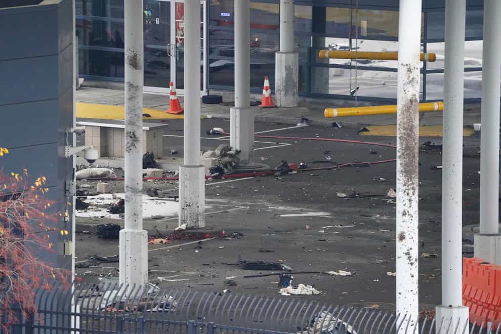 Debris is scattered about inside the customs plaza at the Rainbow Bridge border crossing (Derek Gee/AP)
