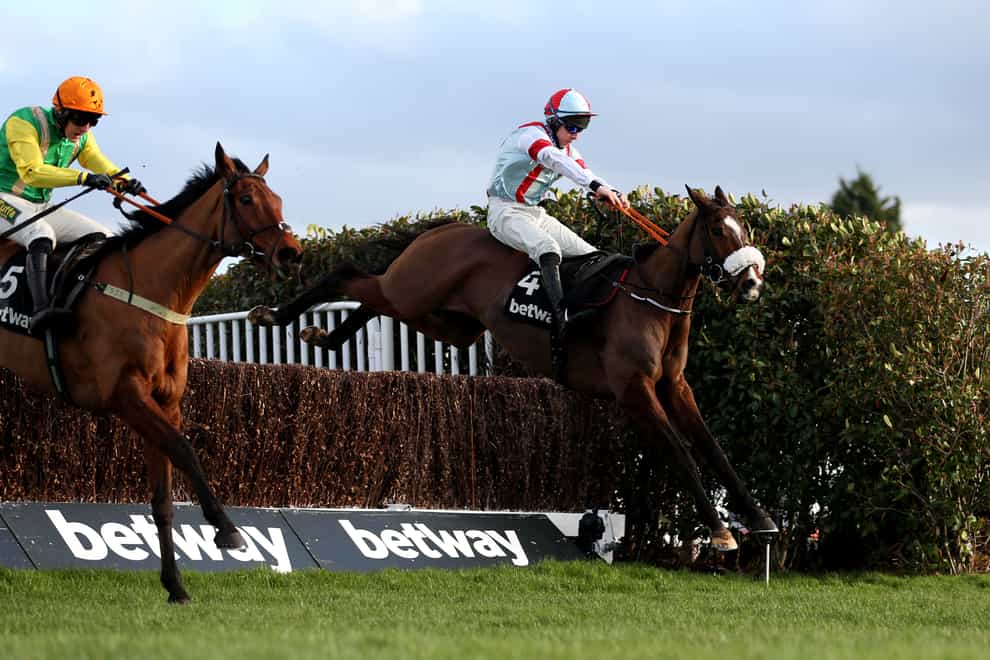 Itchy Feet ridden by jockey Gavin Sheehan goes onto wins the Betway Scilly Isles Novices’ Chase at Sandown Park Racecourse, Esher (Steven Paston/PA)