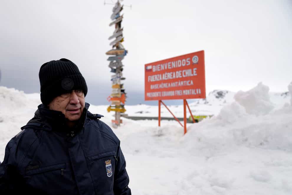 UN secretary-general Antonio Guterres stands outside a Chilean air force base in King George Island, Antarctica (Jorge Saenz/AP/PA)