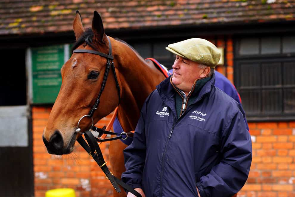 Trainer Paul Nicholls with Bravemansgame during a visit to Manor Farm Stables (Ben Birchall/PA)
