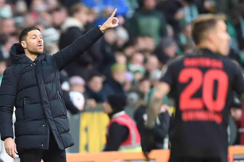 Xabi Alonso enjoyed a memorable 42nd birthday after Bayer Leverkusen won 3-0 at Werder Bremen (Carmen Jaspersen/dpa via AP)