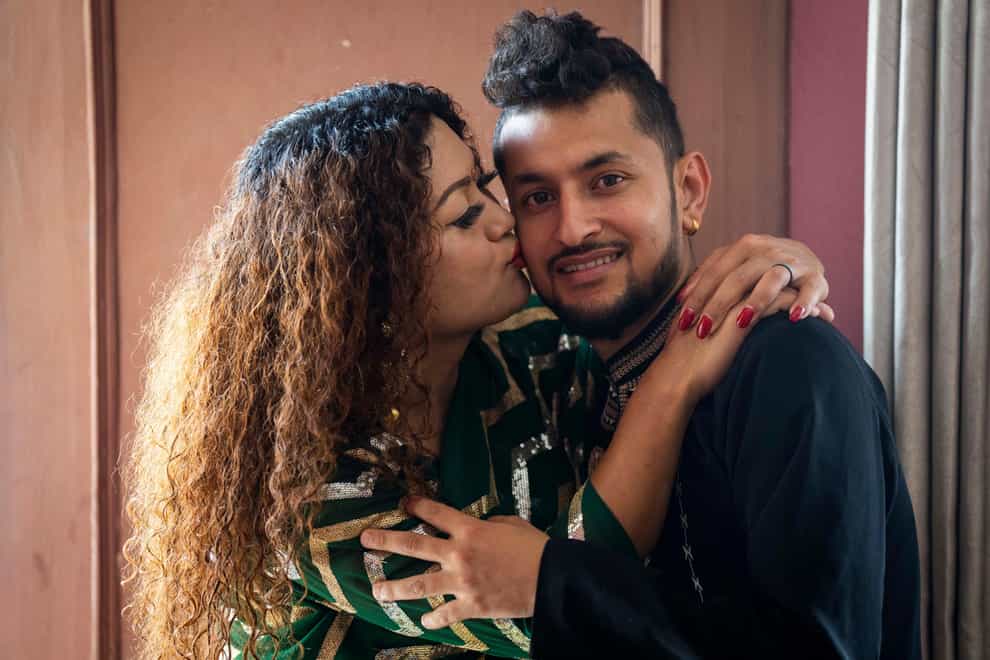 Surendra Pandey and Maya Gurung, who got married six years ago, became the first in the nation to receive official same-sex marriage status (AP Photo/Niranjan Shrestha, File)