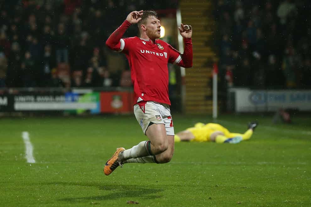 Andy Cannon celebrates scoring Wrexham’s second goal (Barrington Coombs/PA)