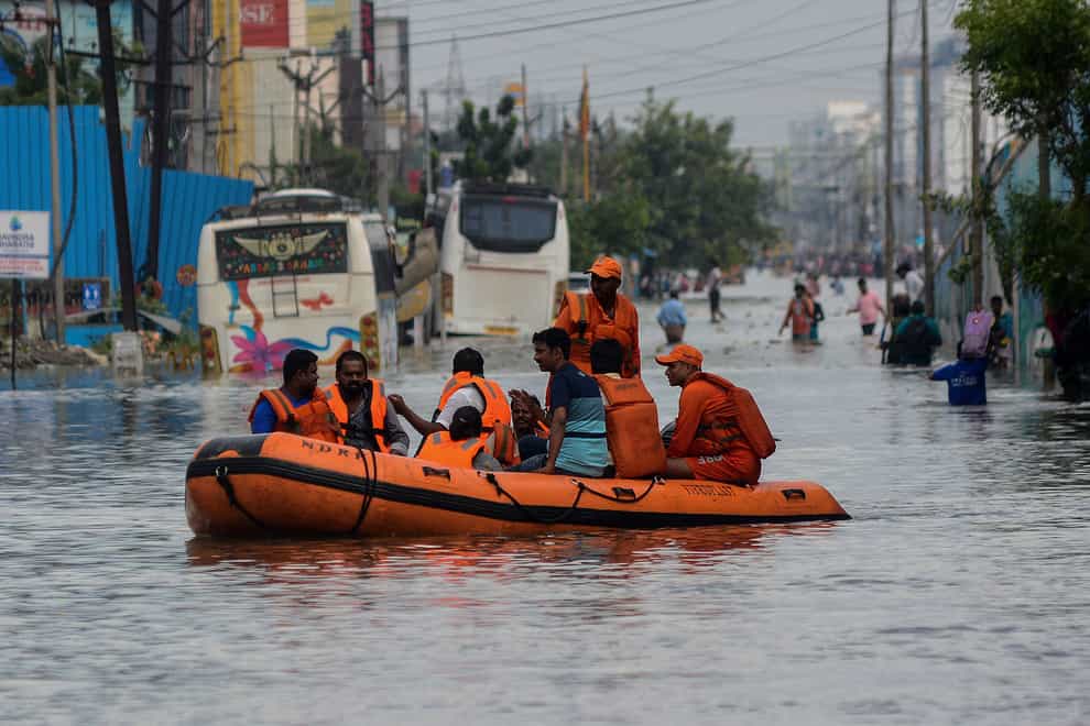 People were evacuated from flooded areas following heavy rains along the Bay of Bengal coast in Chennai (AP)