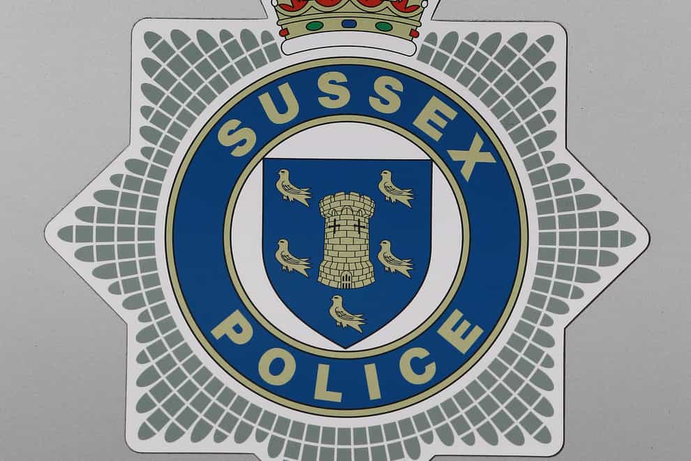 A Sussex Police officer has been charged (PA)