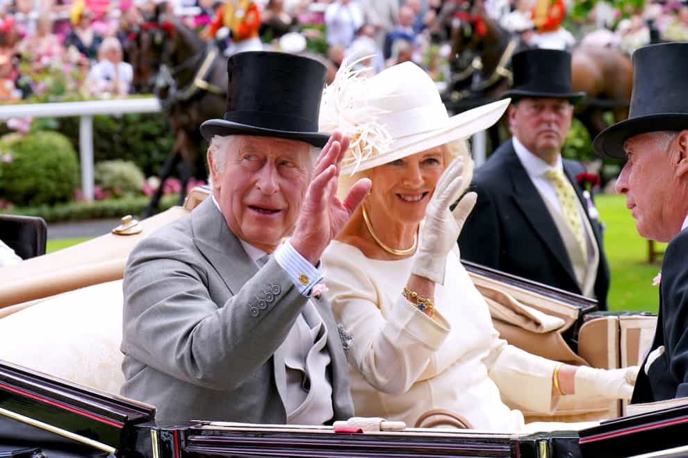 King Charles III and Queen Camilla enjoying Royal Ascot (Jonathan Brady/PA)