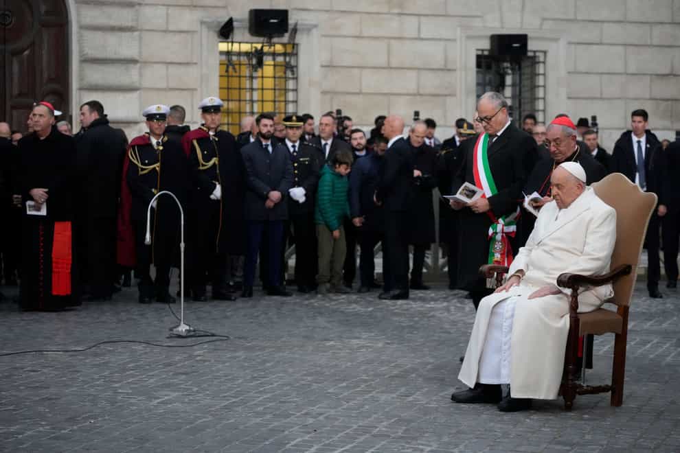 Pope Francis prayed at a statue of Mary near the Spanish Steps in Rome (Gregorio Borgia/AP)