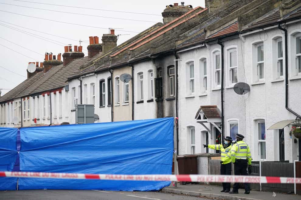 Police at the scene of the fire in Collingwood Road, Sutton (Yui Mok/PA)